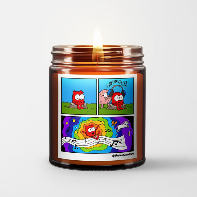 The Awkward Yeti Scented Candle in Amber Glass Jar: Gift of Music - Candlefy