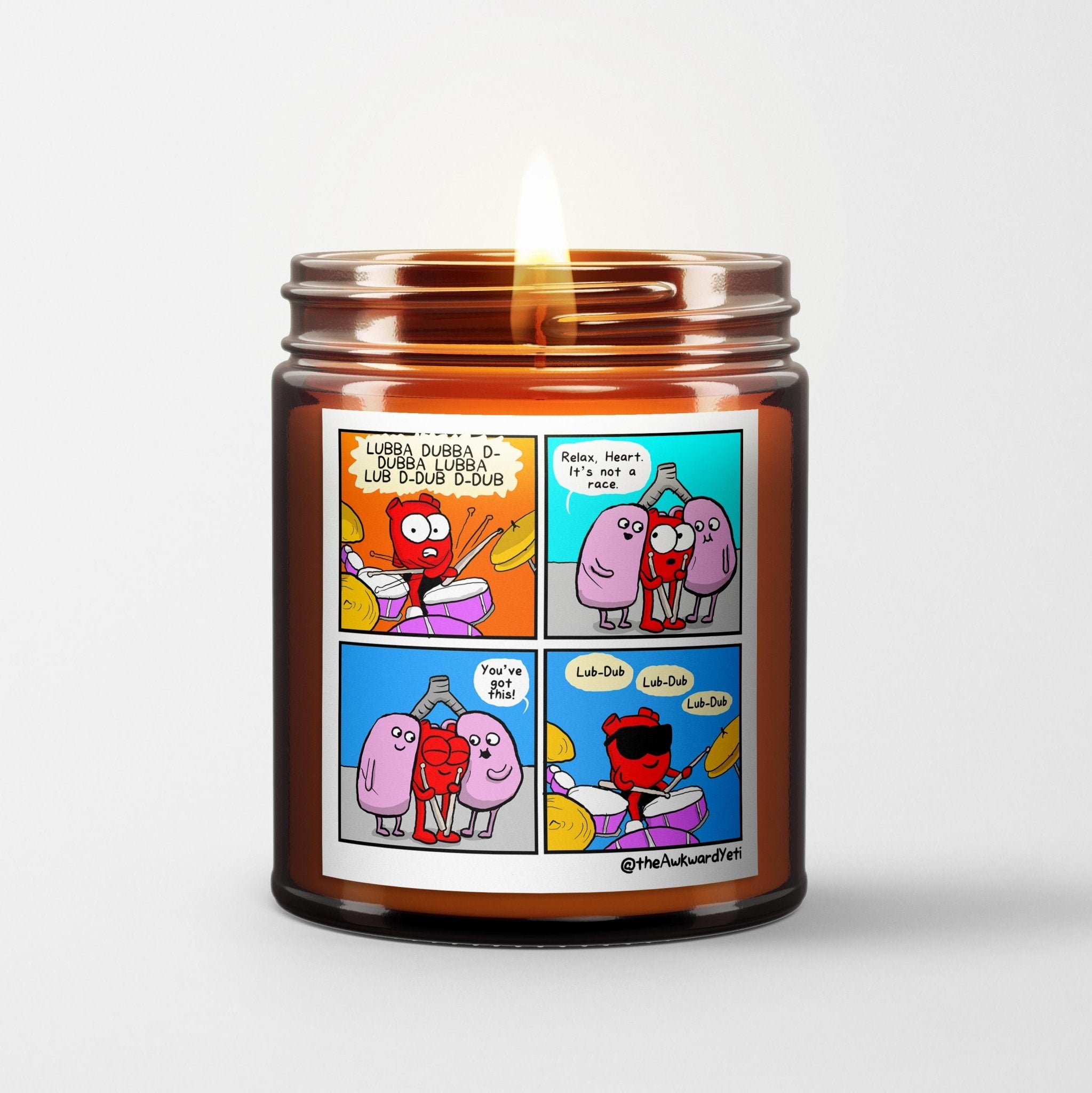 The Awkward Yeti Scented Candle in Amber Glass Jar: Heart's Beat - Candlefy