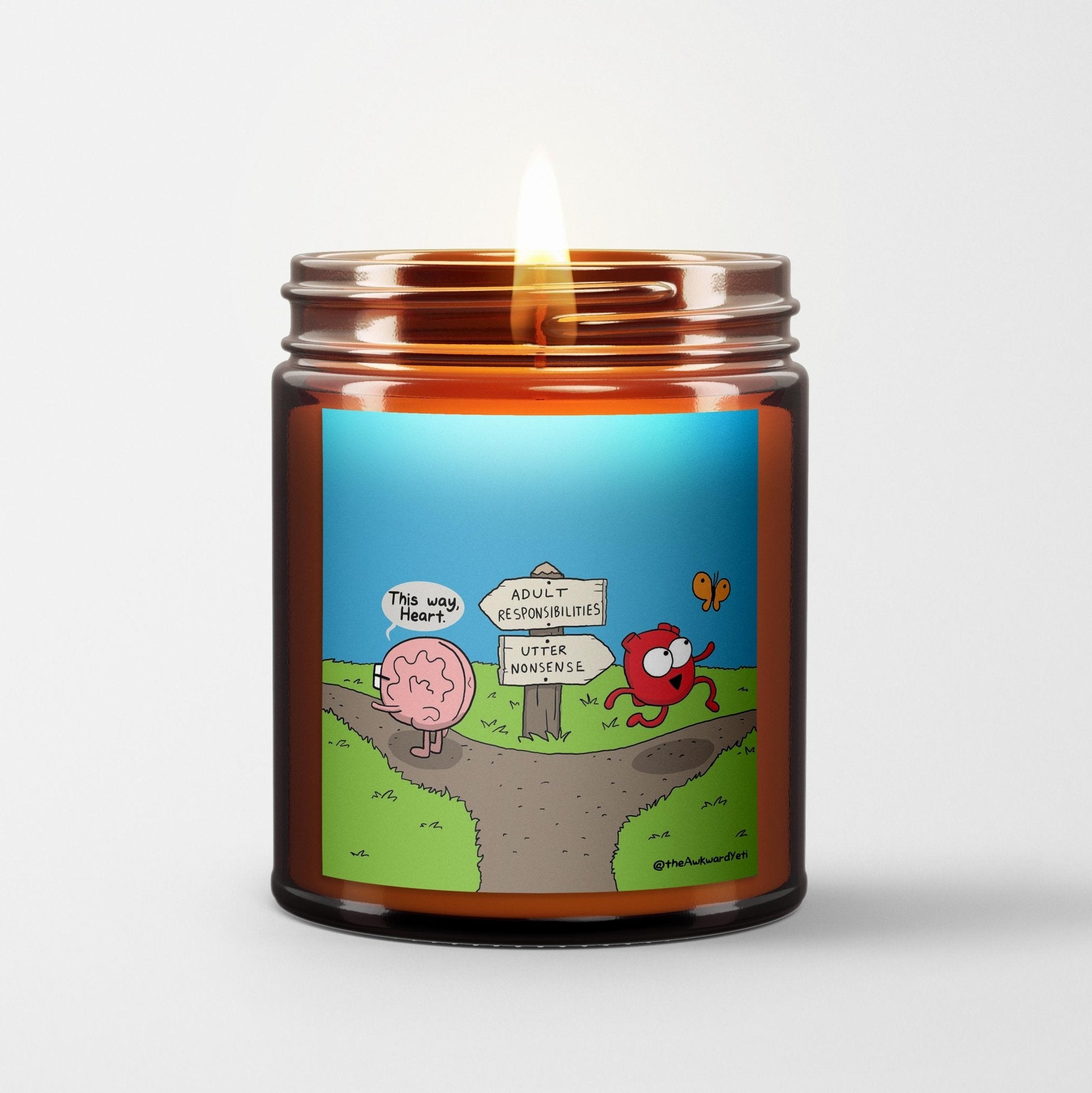 The Awkward Yeti Scented Candle in Amber Glass Jar: The Fork - Candlefy